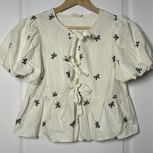 New'm Cream Embroidered Bow Print Coquette Puff Sleeve Tie Front Peplum Blouse